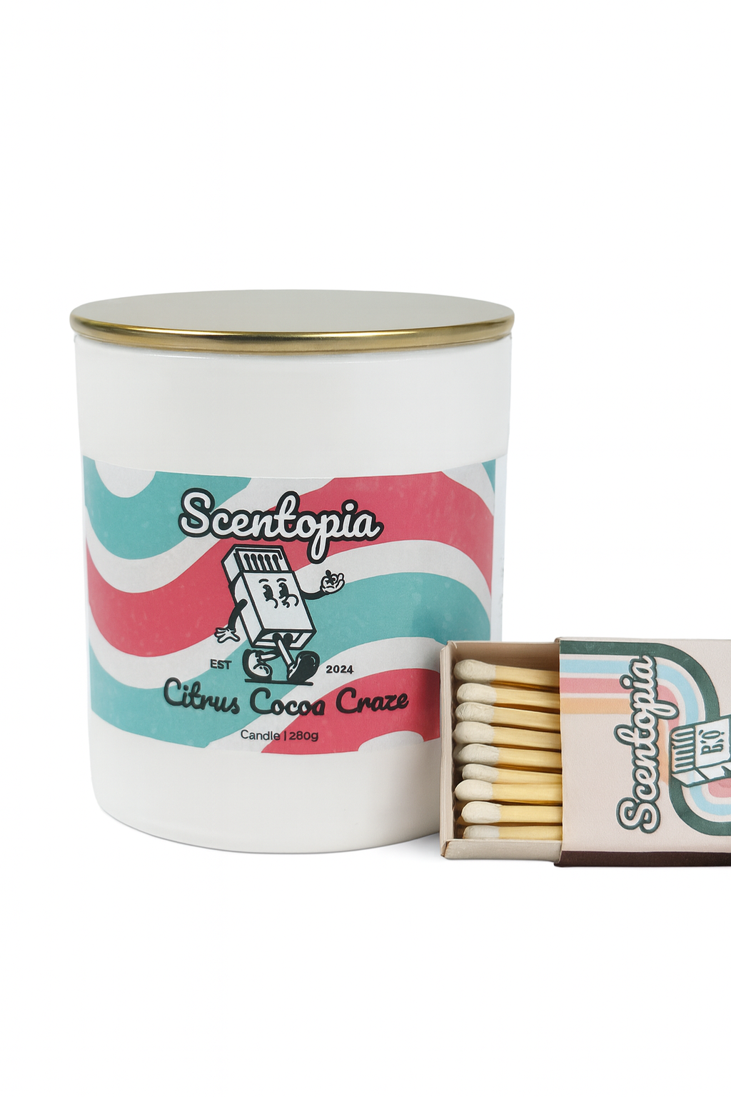 Scentopia candle with matches on a white background