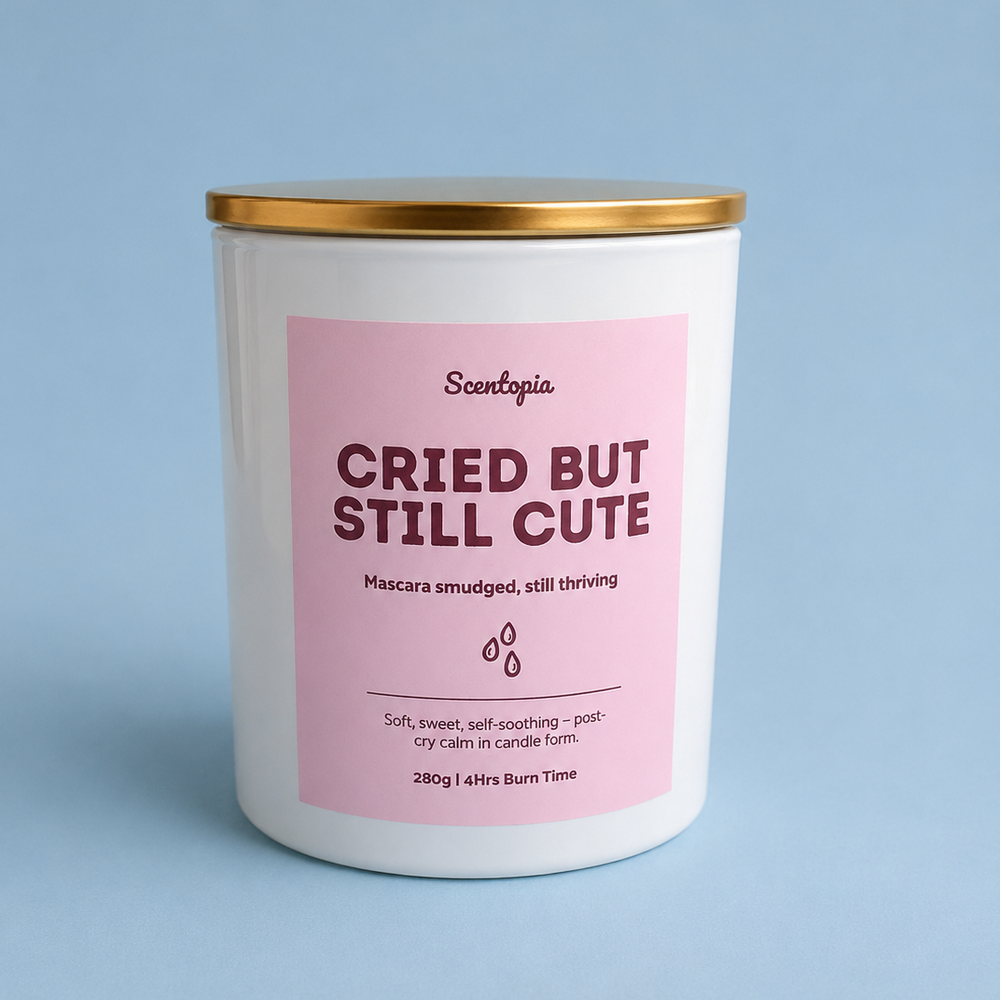 Candle with pink label on a blue background