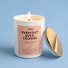 Candle with 'Everyday Over-Thinker' label on a blue background