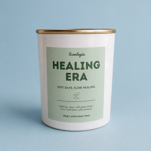 Candle with 'Healing Era' label on a light blue background