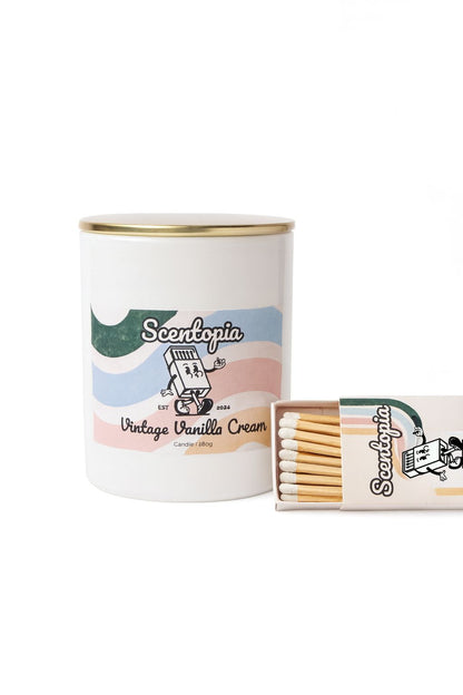Scentopia candle and matches on a white background