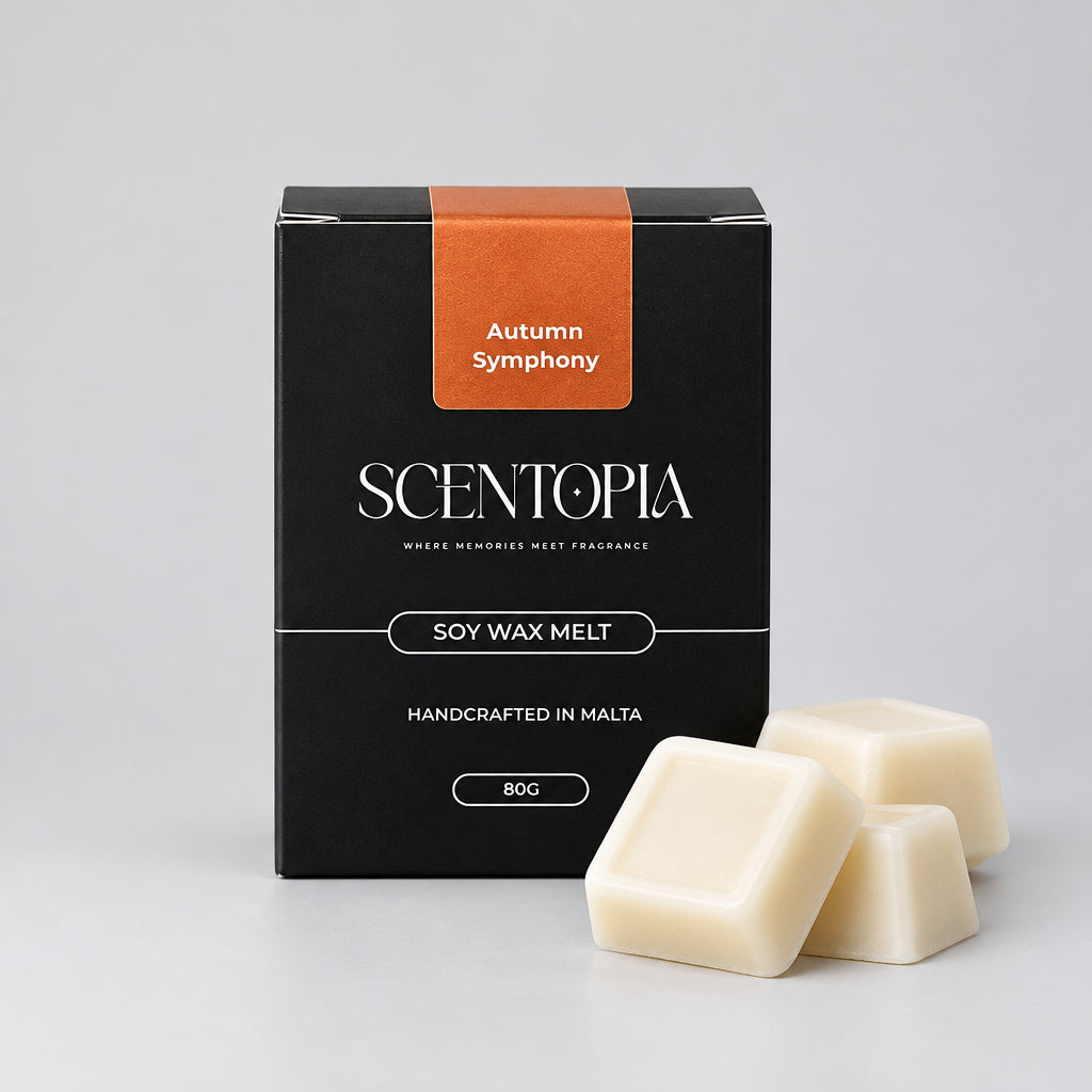 A black box of SCENTOPIA 'Autumn Symphony' soy wax melt, placed on a wooden surface against a plain light background.
