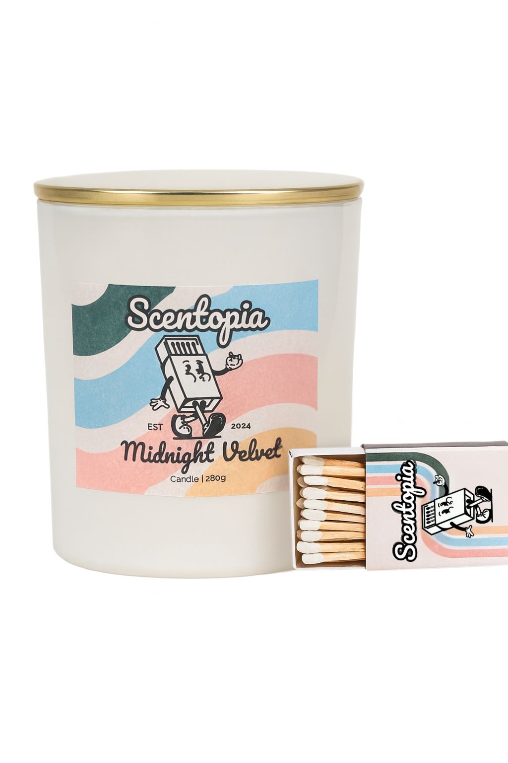 Scentopia candle with matches on a white background